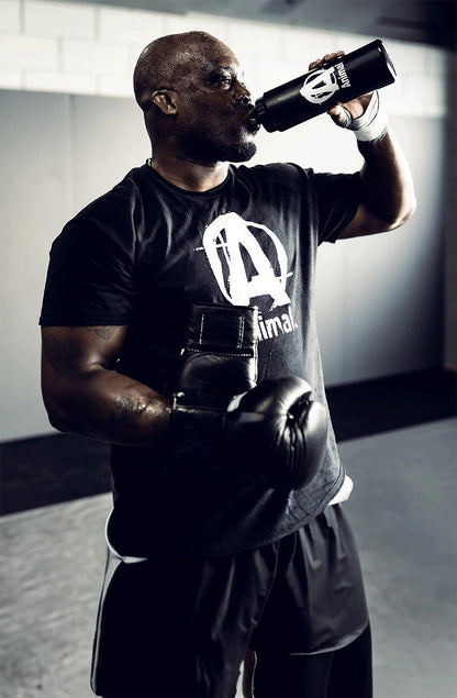 athlete holding Animal squeezable water bottle