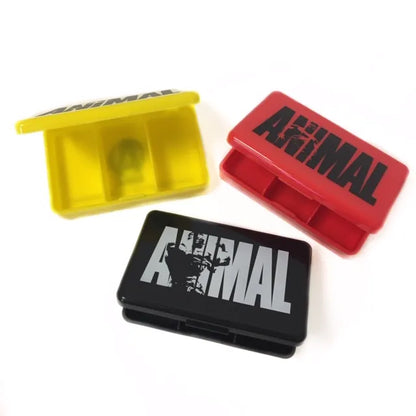 Animal Pill Case ouvert montrant les compartiments pour compléments
